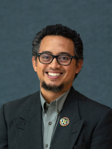 Dr. Alexis Racelis